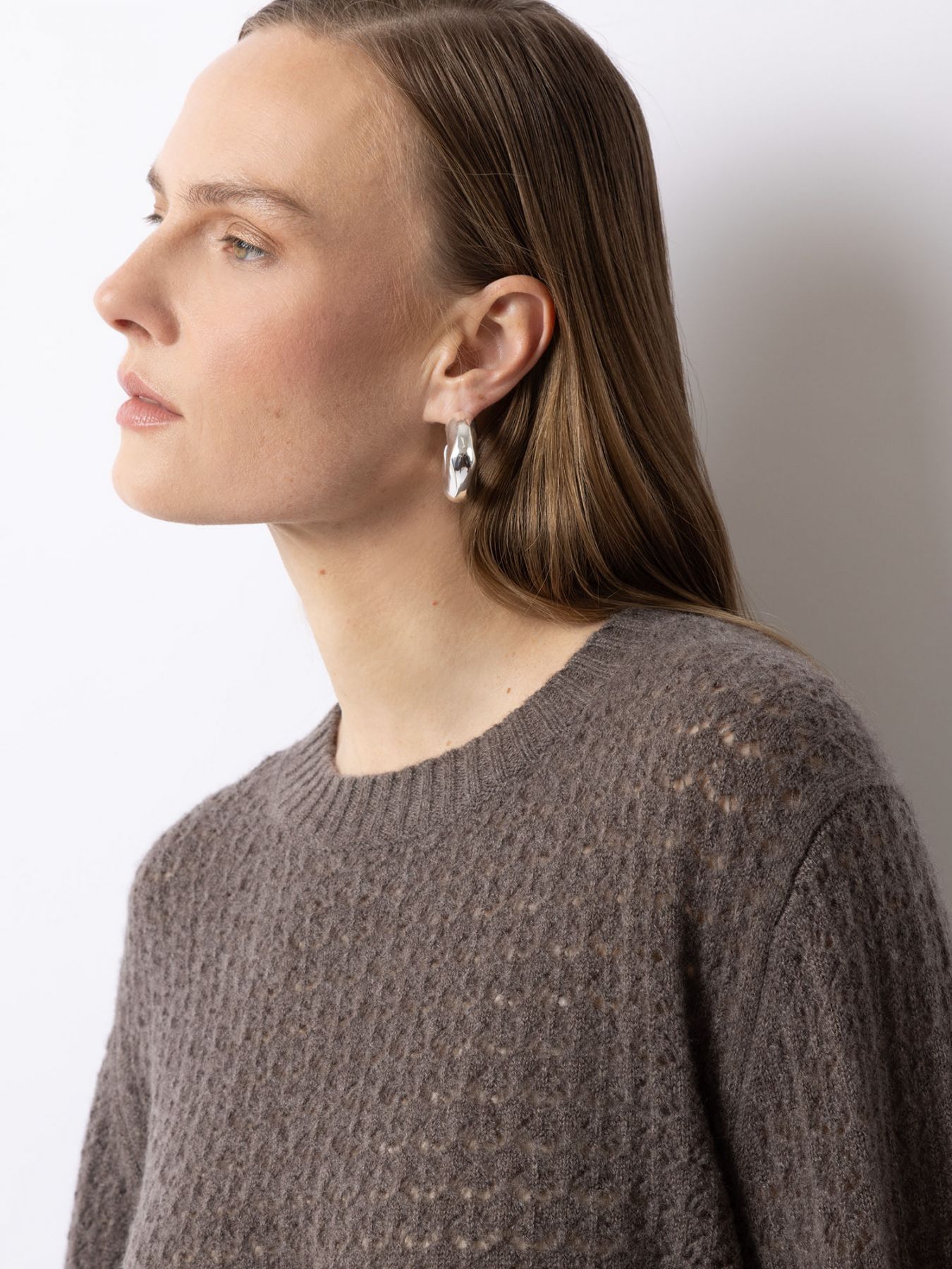 Poncho im Ajour Strick