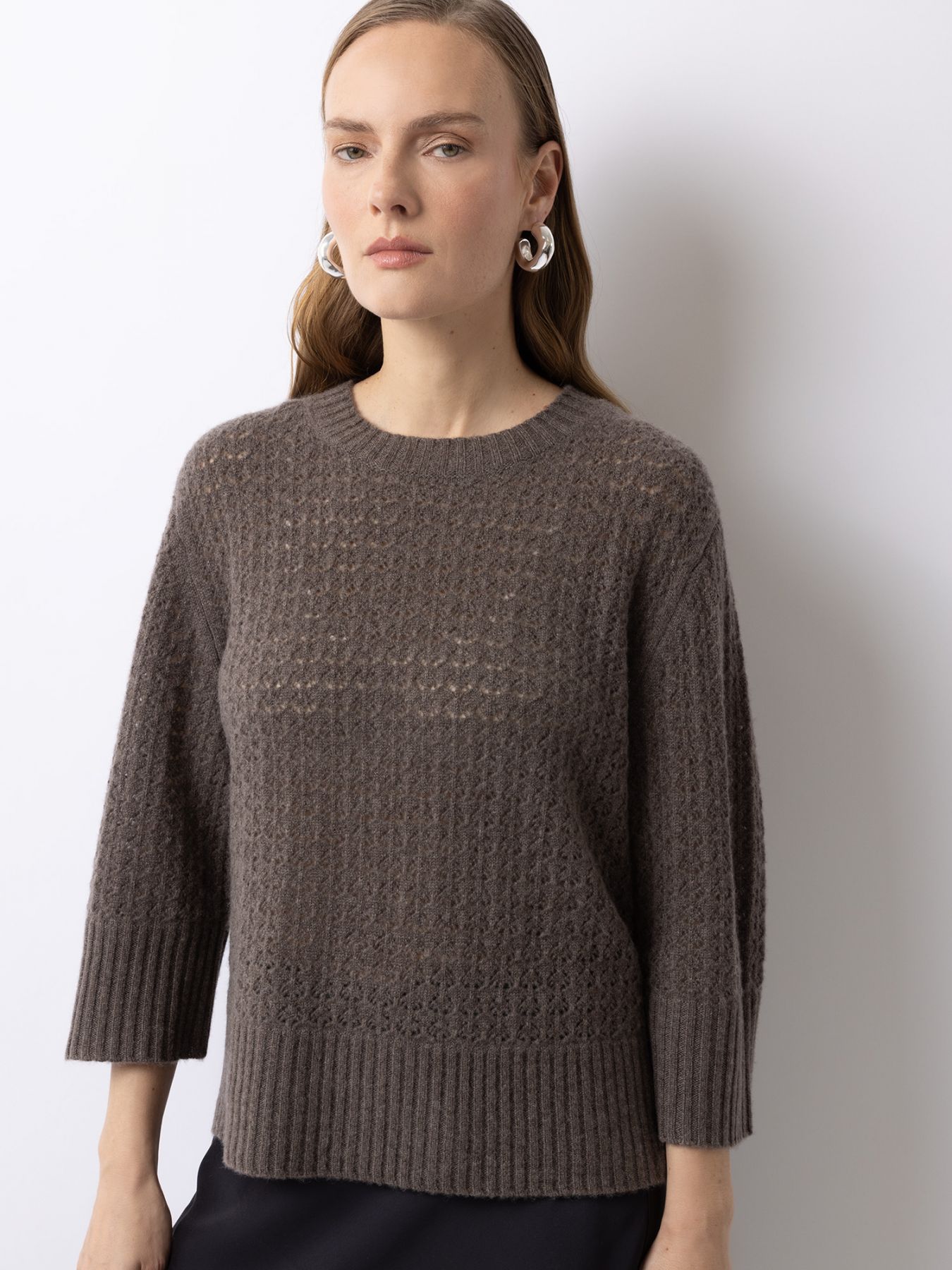 Poncho im Ajour Strick